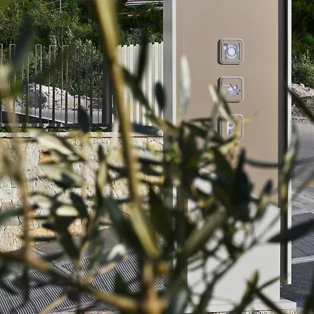 Отель Asters Ксамил